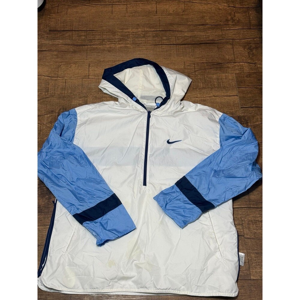Vintage white and blue women’s Nike windbreaker. Size XL